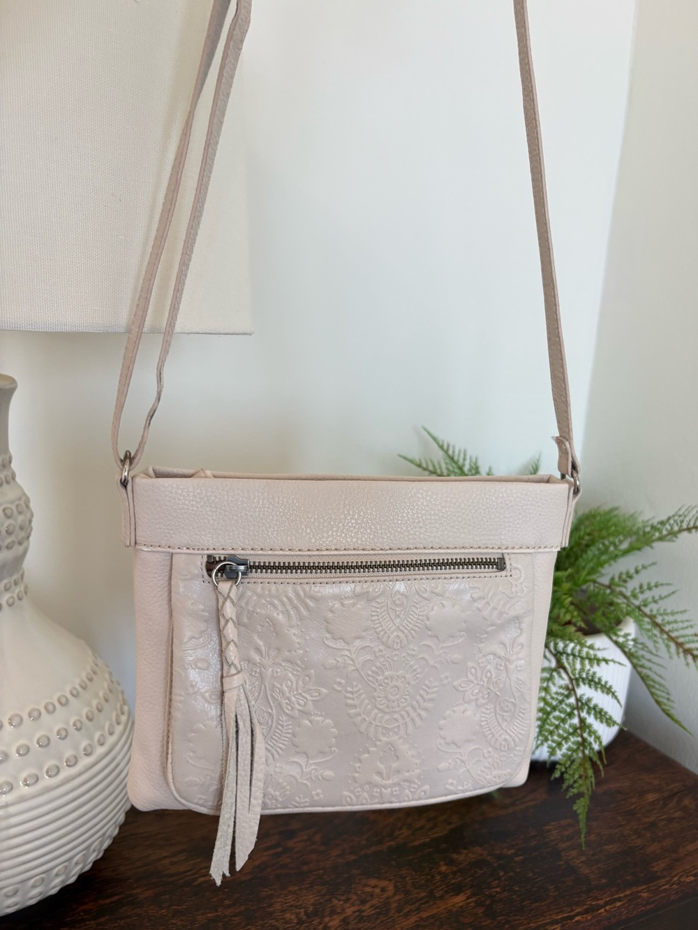The Sak Sanibel White Floral Boho Embossed Leather Crossbody w Tassel - Cream
